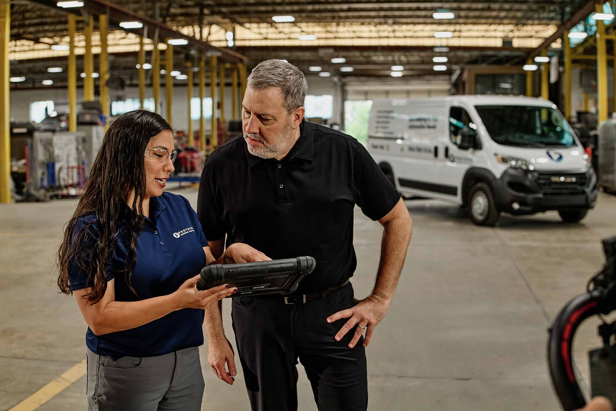 Protech teammates reviewing calibration information